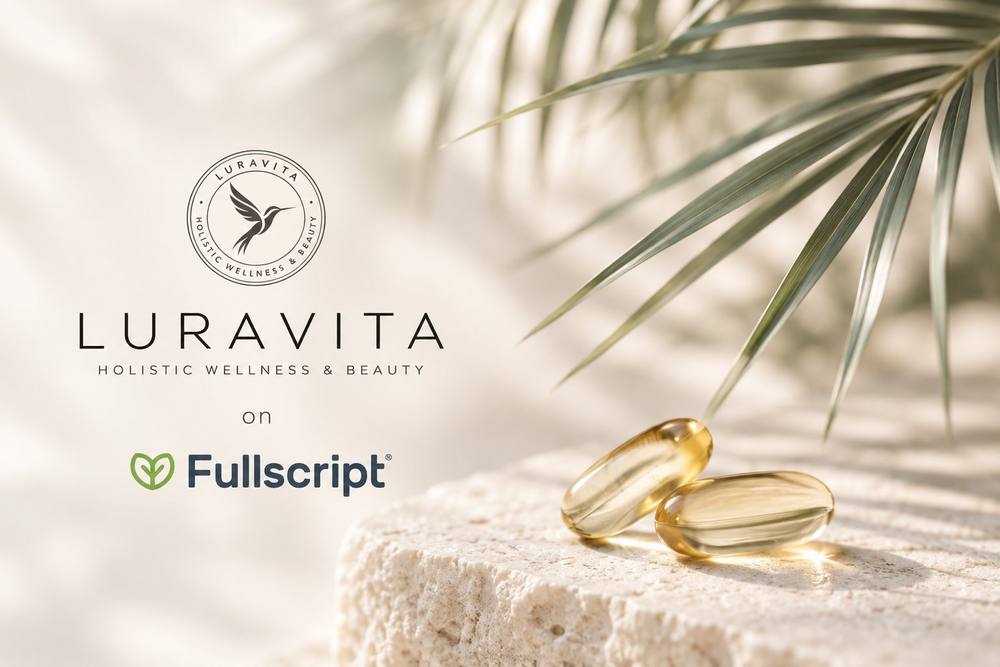 Luravita on Fullscript: two softgel supplements on a stone with a palm frond